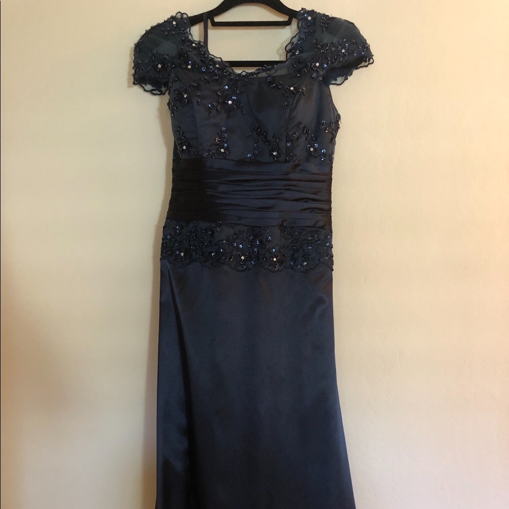 Brand new- never been worn. No tags on Navy blue “ mother of the bride “ dress